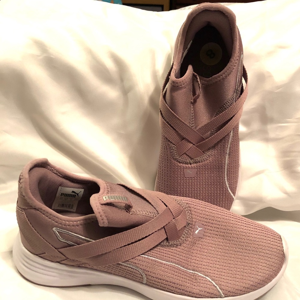 Rose gold PUMA athletic sneakers